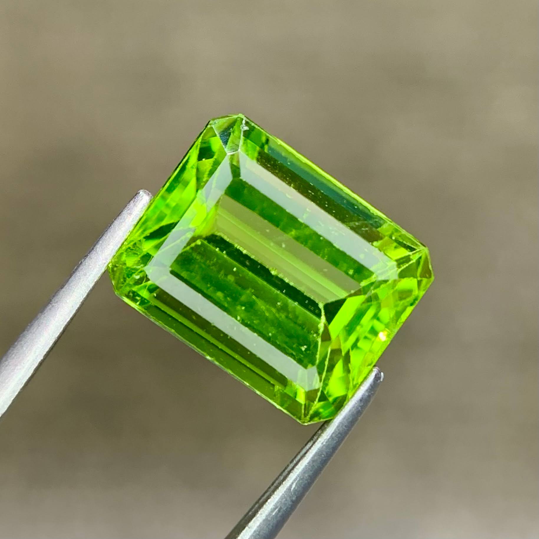 4.06ct Leaf Green Peridot Emerald Cut