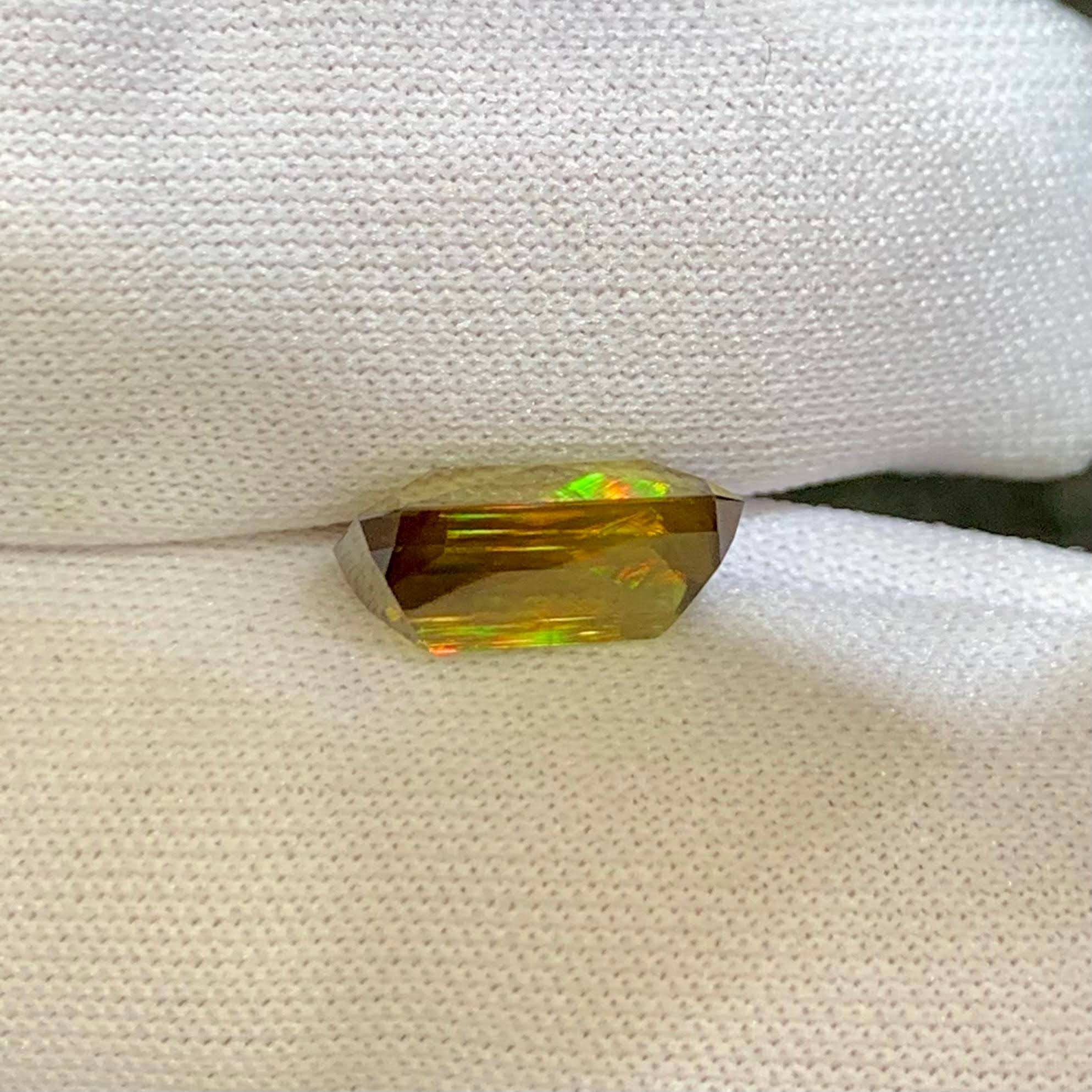 4-67-carats-fire-rainbow-sphene-octagon-radiant-cut-madagascar