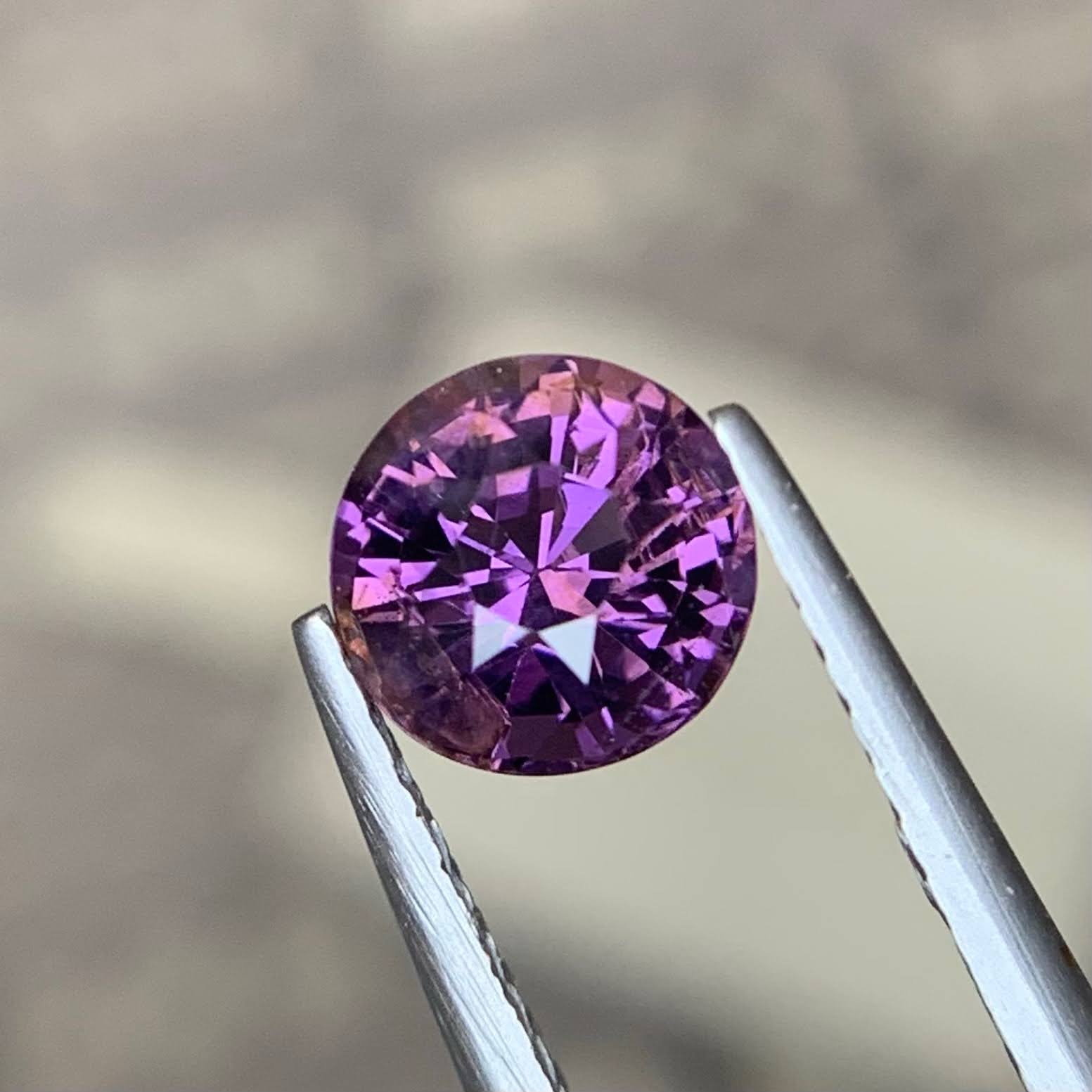 natural-purplish-spinel-1-24ct-burma-round-faceted