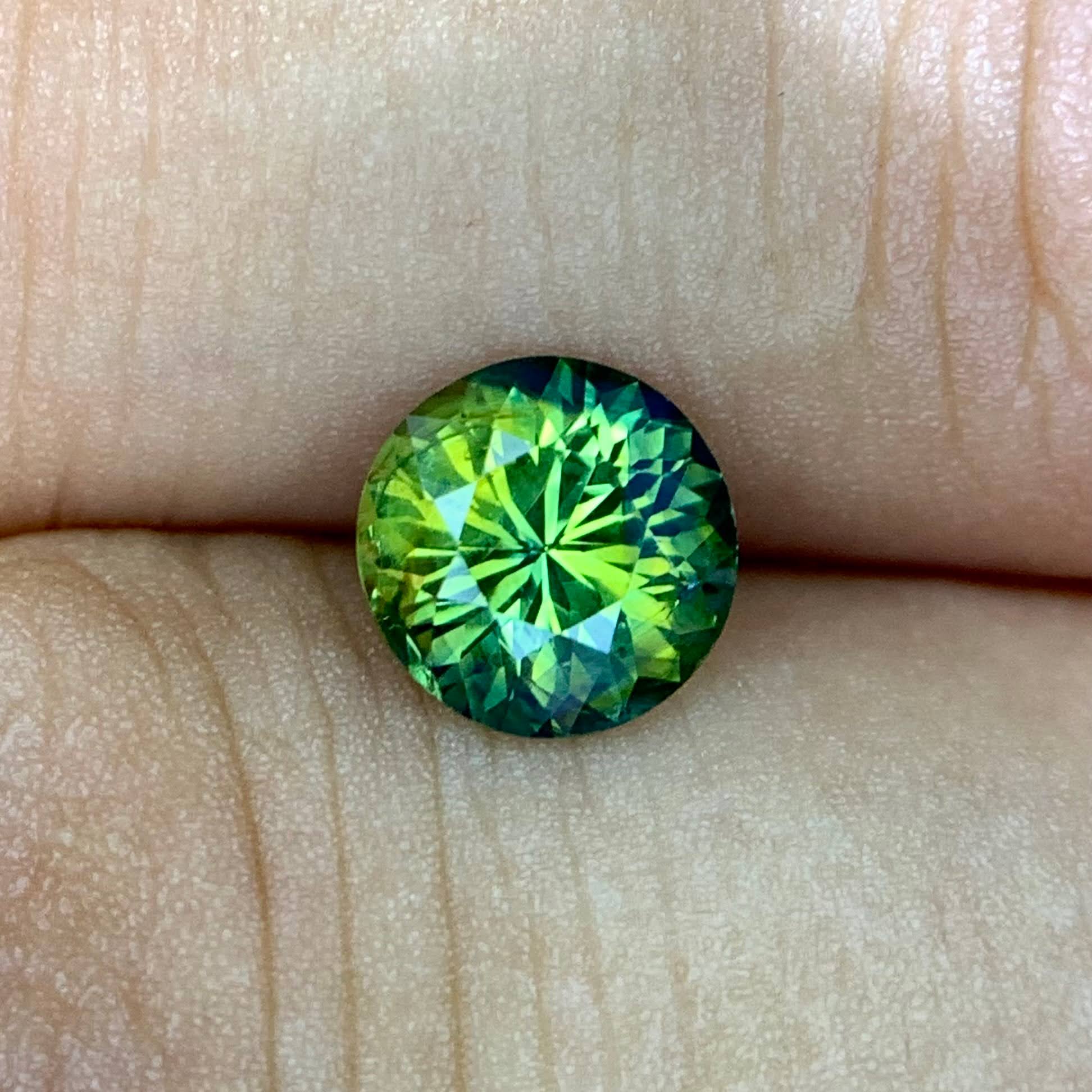 natural-teal-sapphire-1-42ct-madagascar-round-brilliant