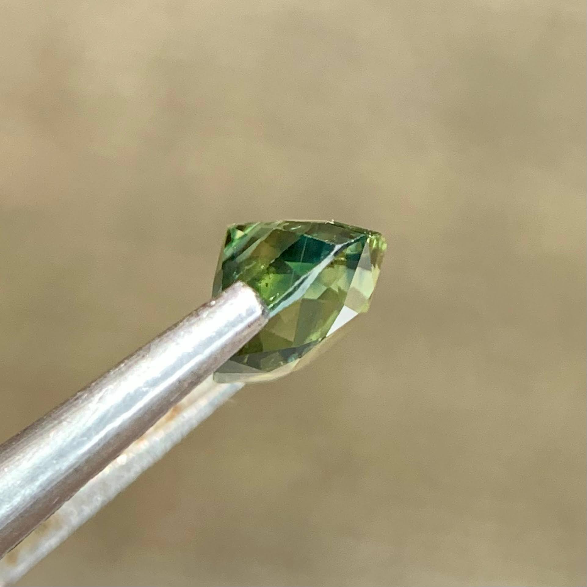 natural-teal-sapphire-1-30ct-madagascar-cushion