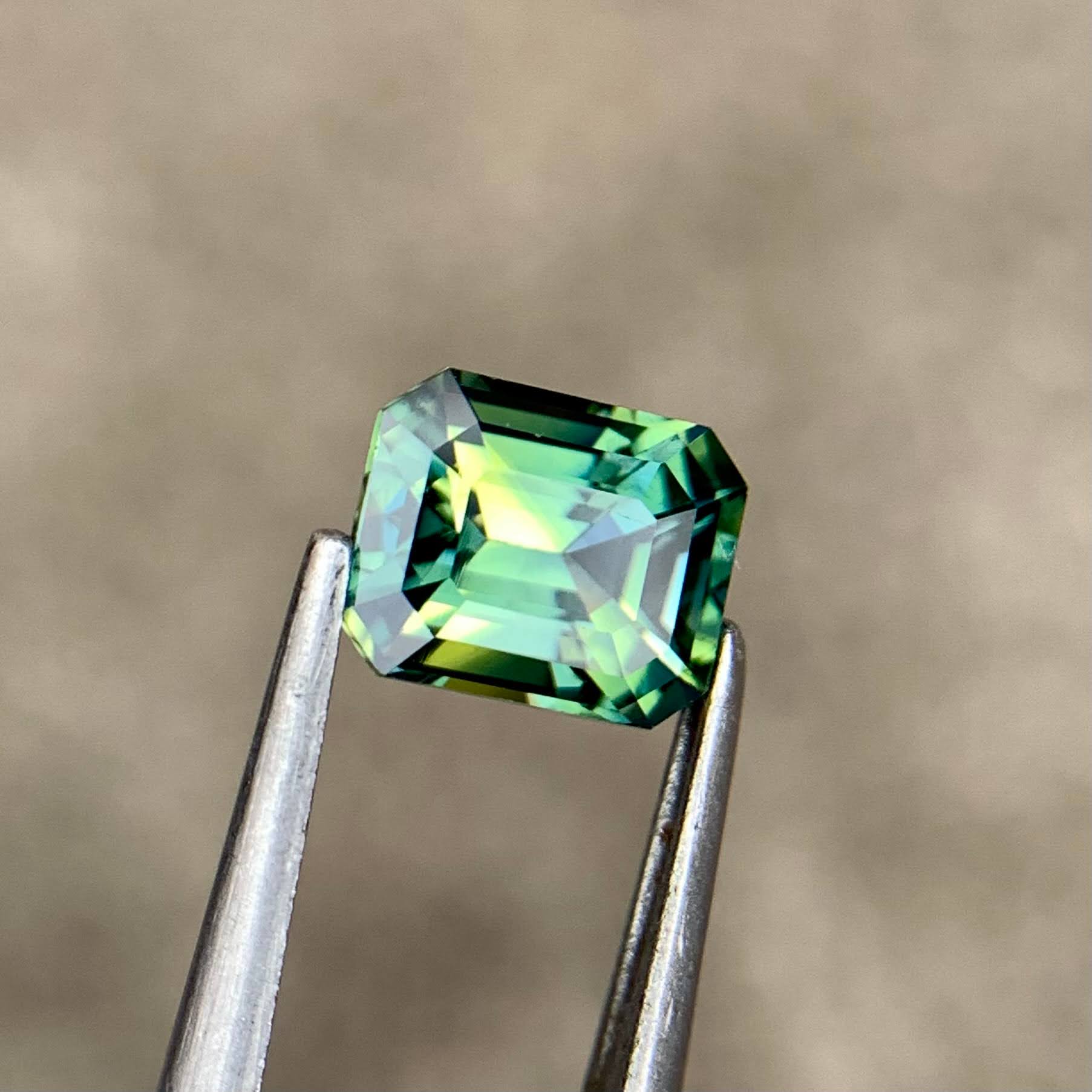 1-16ct-natural-bicolor-sapphire-madagascar-emerald-cut