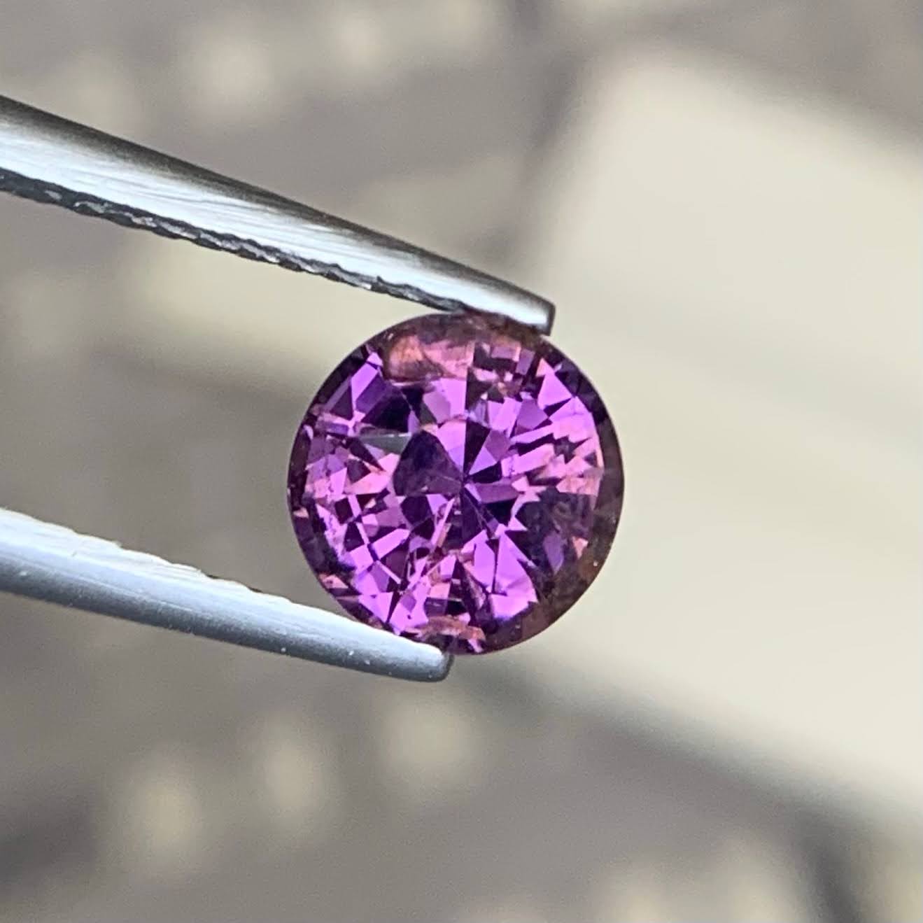 natural-purplish-spinel-1-24ct-burma-round-faceted