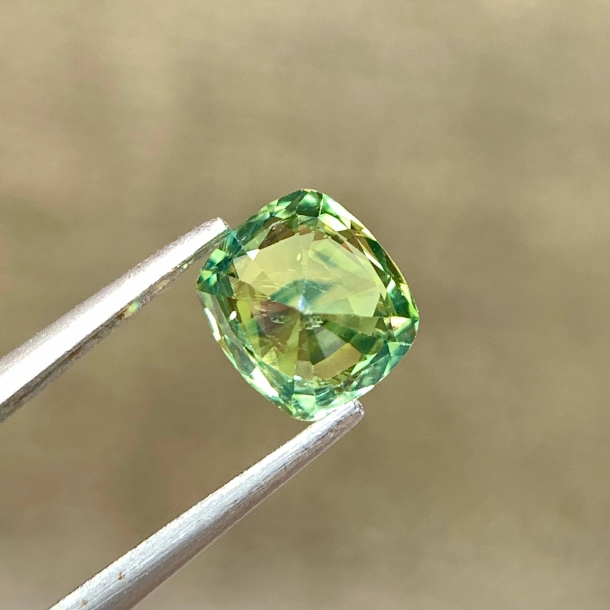 natural-teal-sapphire-1-30ct-madagascar-cushion