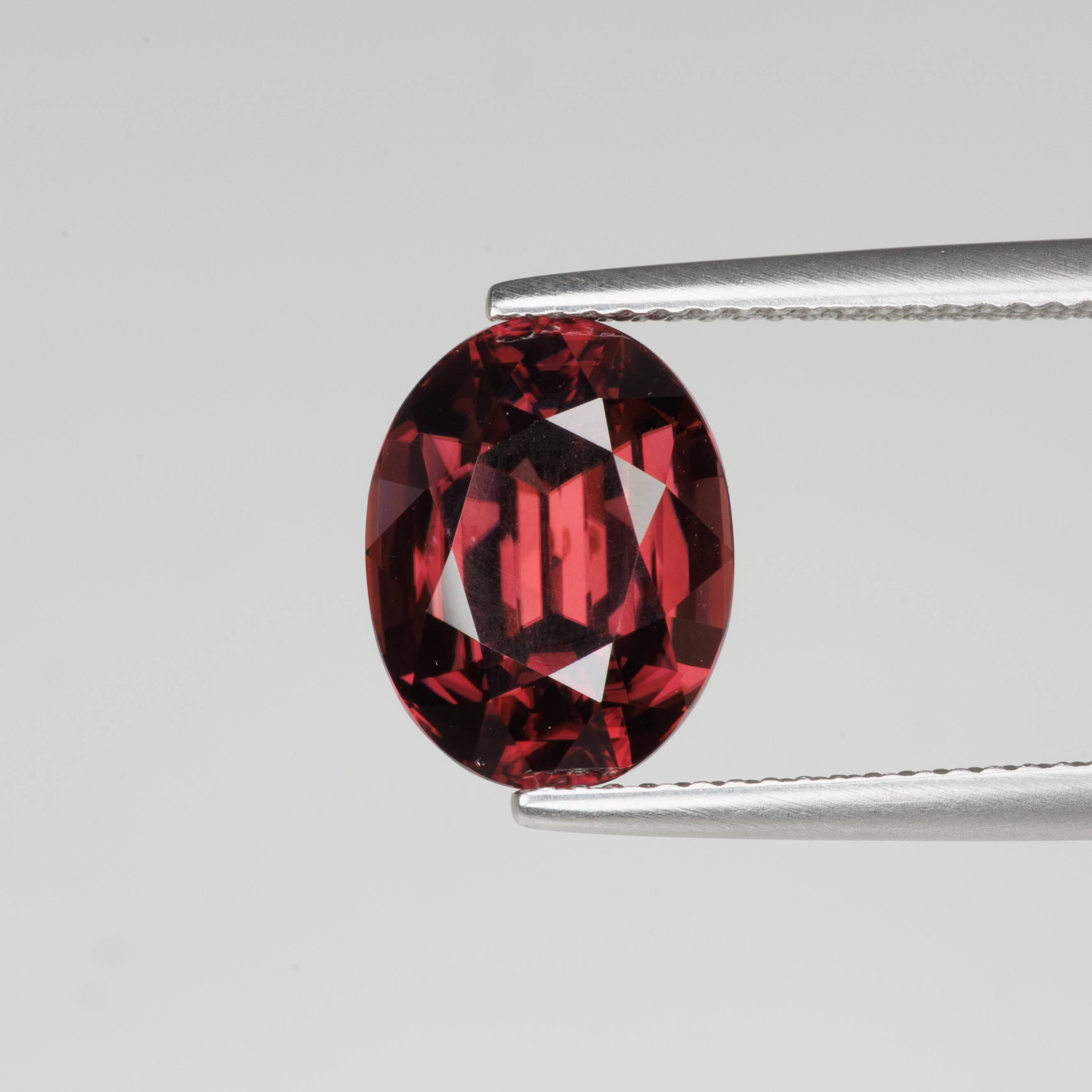 7.08 Carats Oval Red Zircon Stone