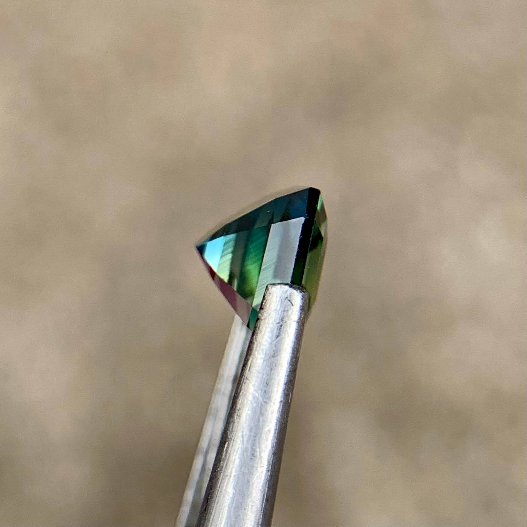 1-16ct-natural-bicolor-sapphire-madagascar-emerald-cut