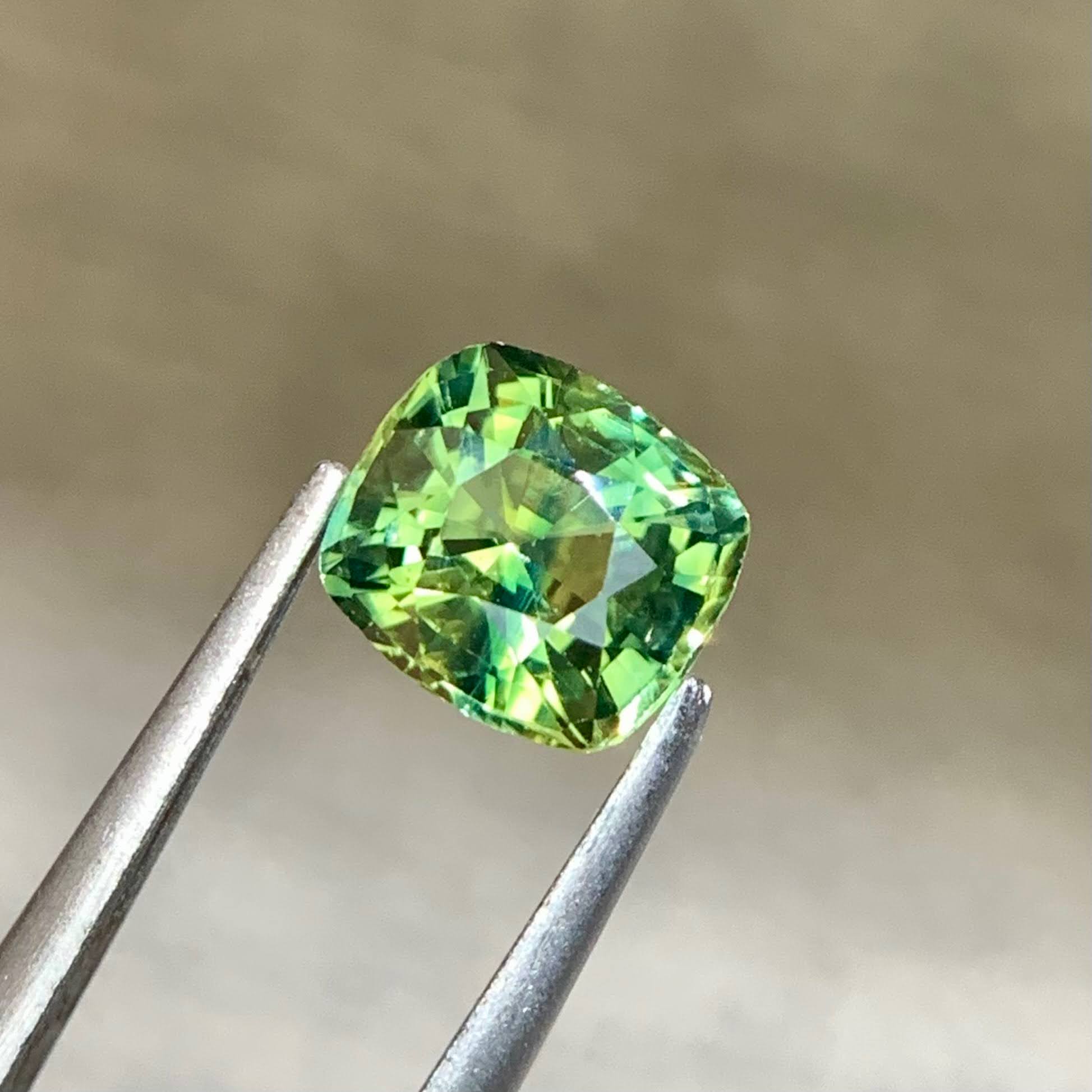 natural-teal-sapphire-1-30ct-madagascar-cushion