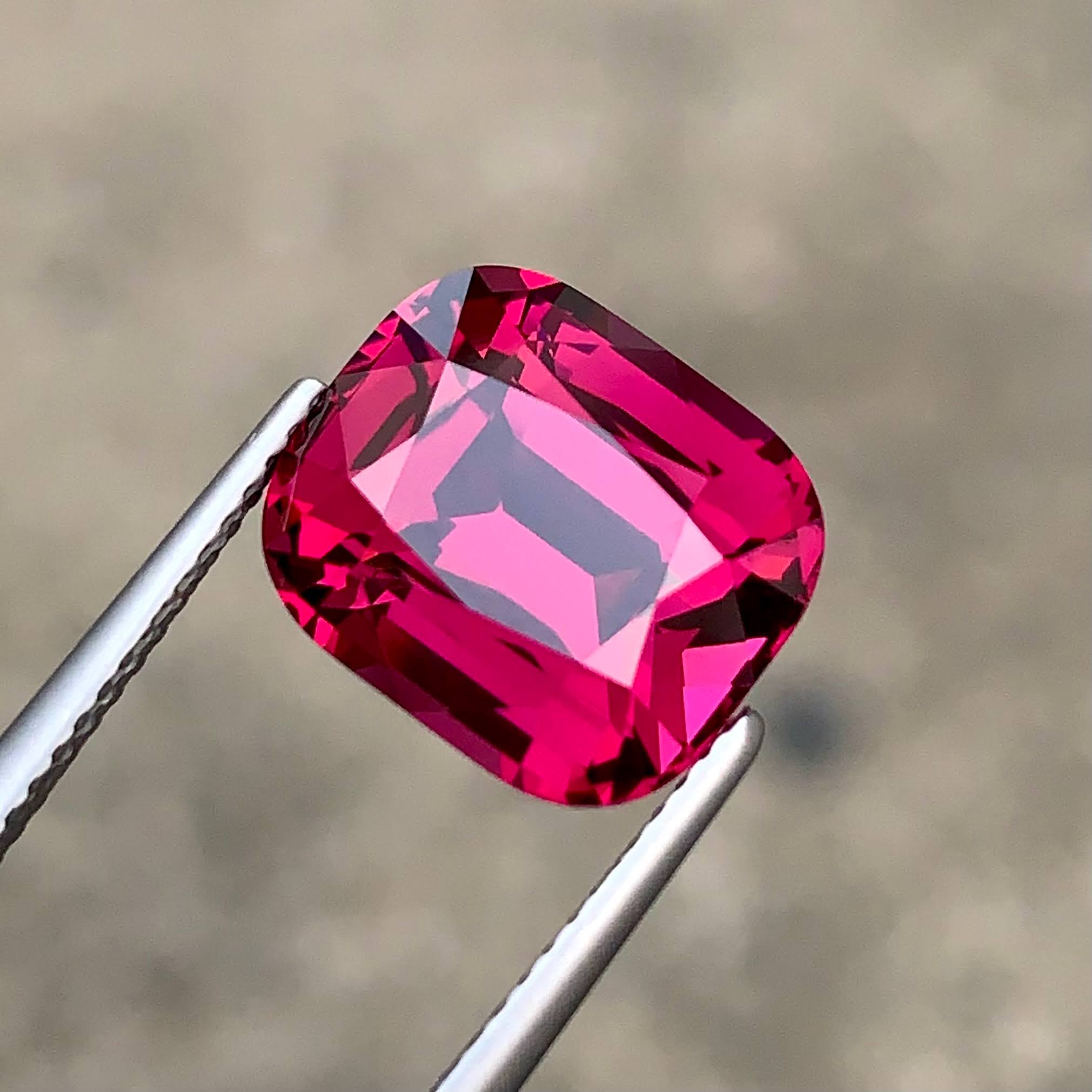 8.15ct Vibrant Pinkish Red Garnet Cushion