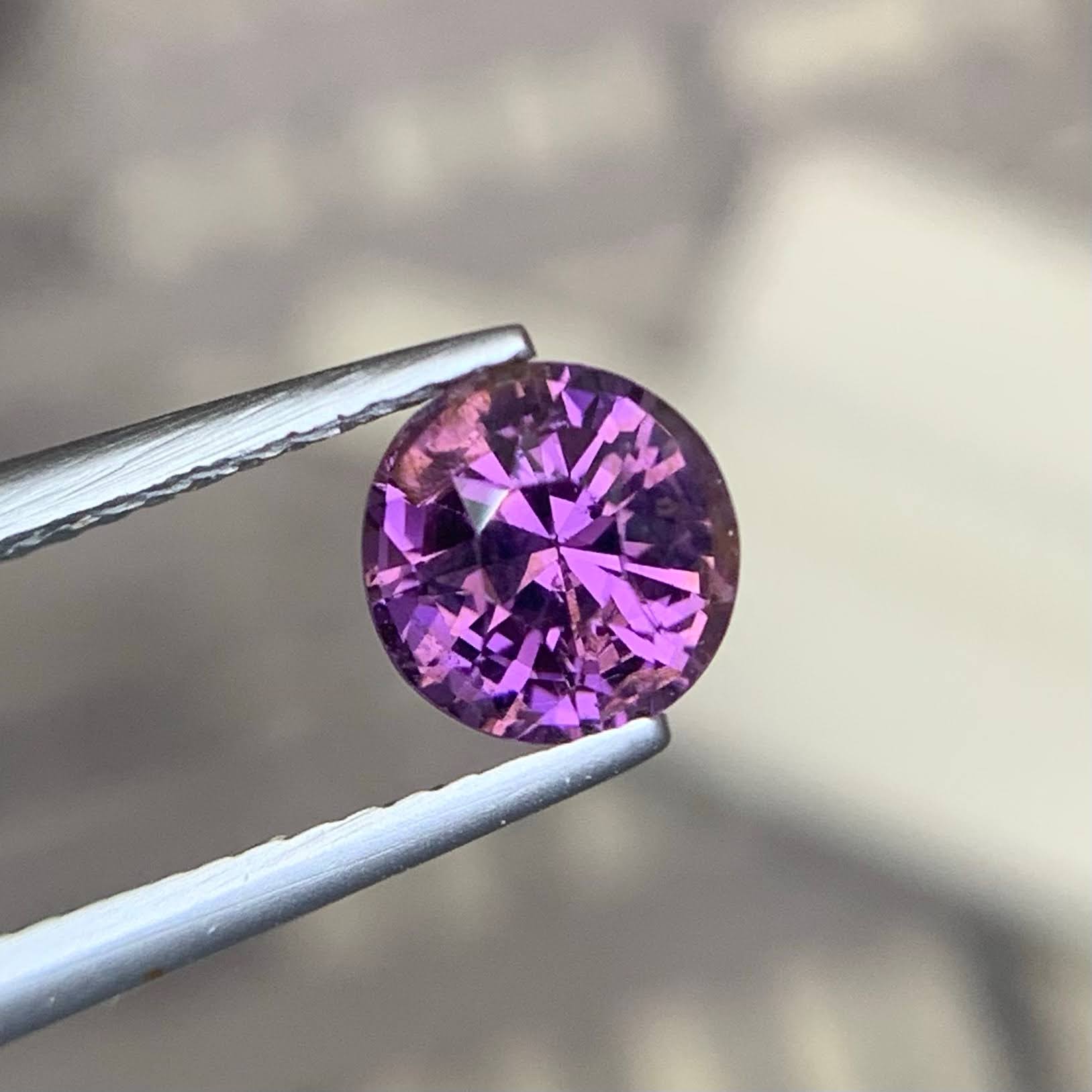 natural-purplish-spinel-1-24ct-burma-round-faceted