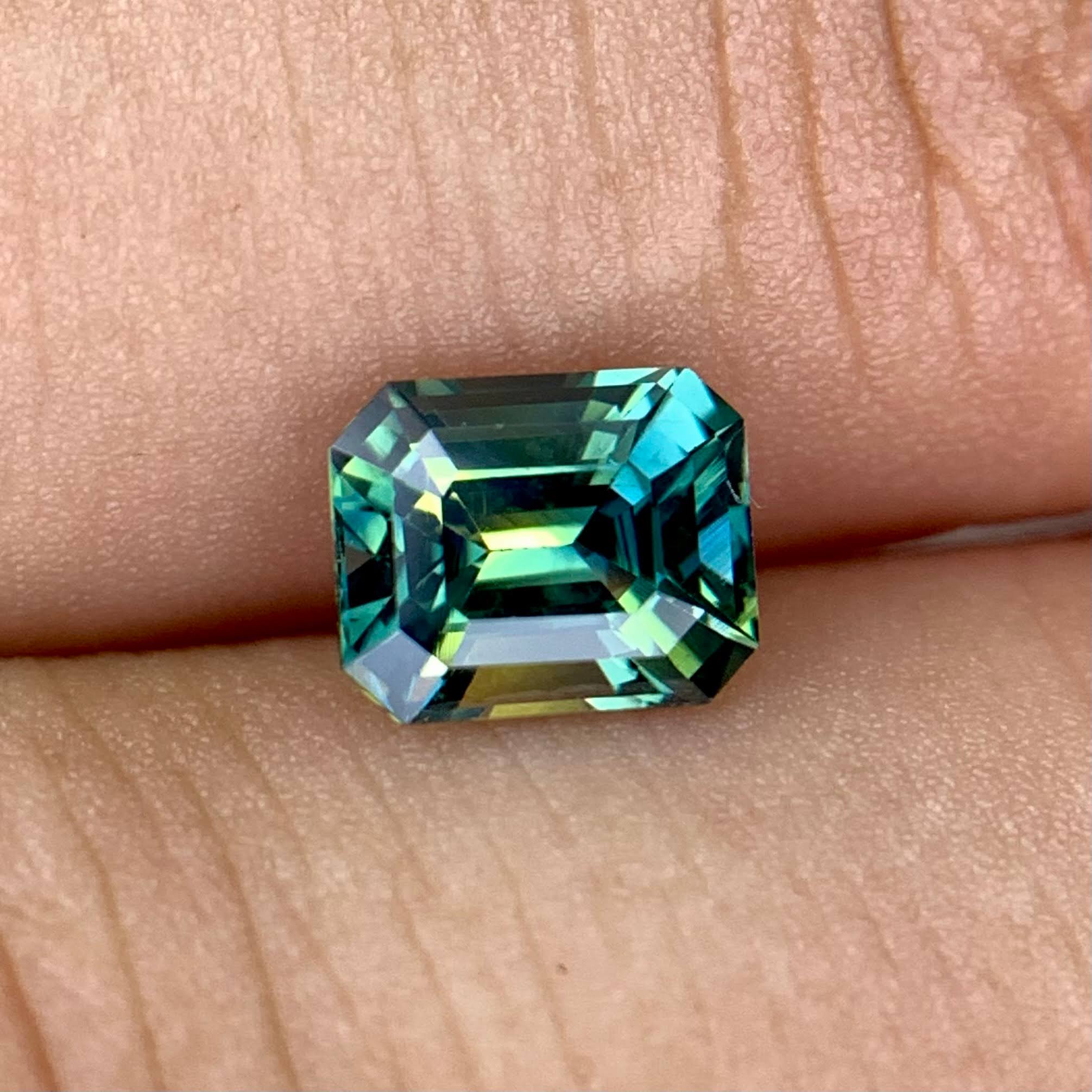 1-16ct-natural-bicolor-sapphire-madagascar-emerald-cut