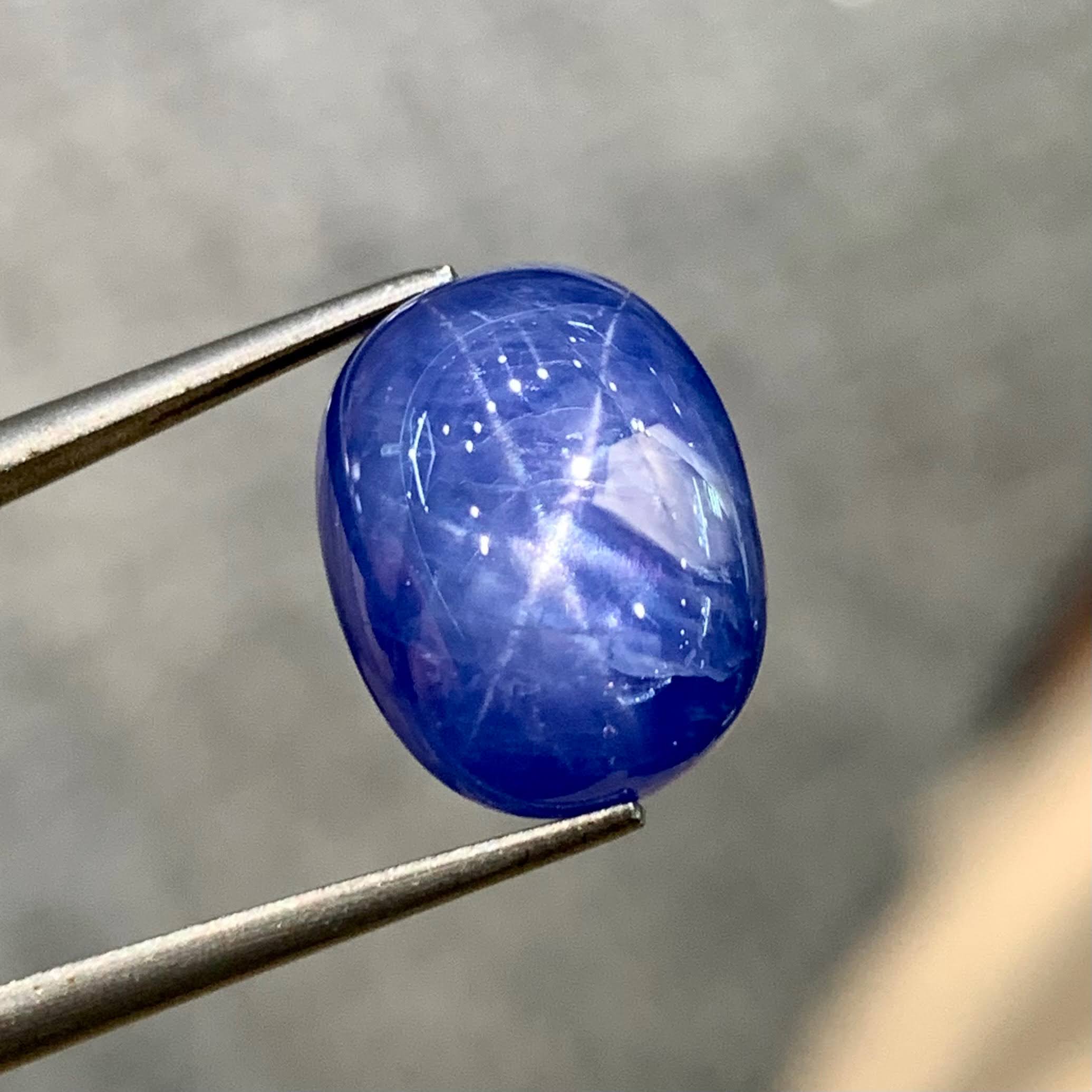 12-34-carats-vivid-blue-star-sapphire-oval-cabochon-burma