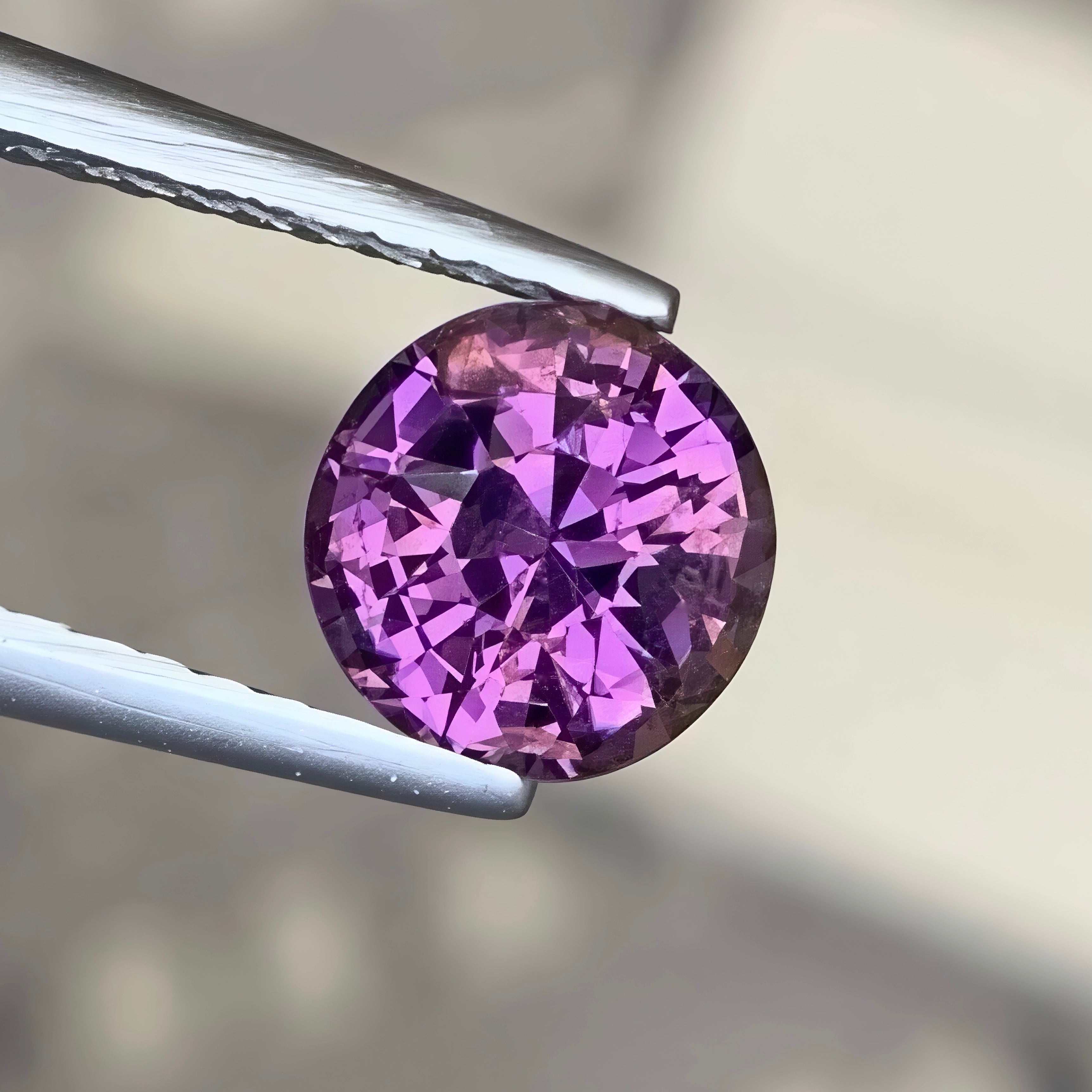 natural-purplish-spinel-1-24ct-burma-round-faceted