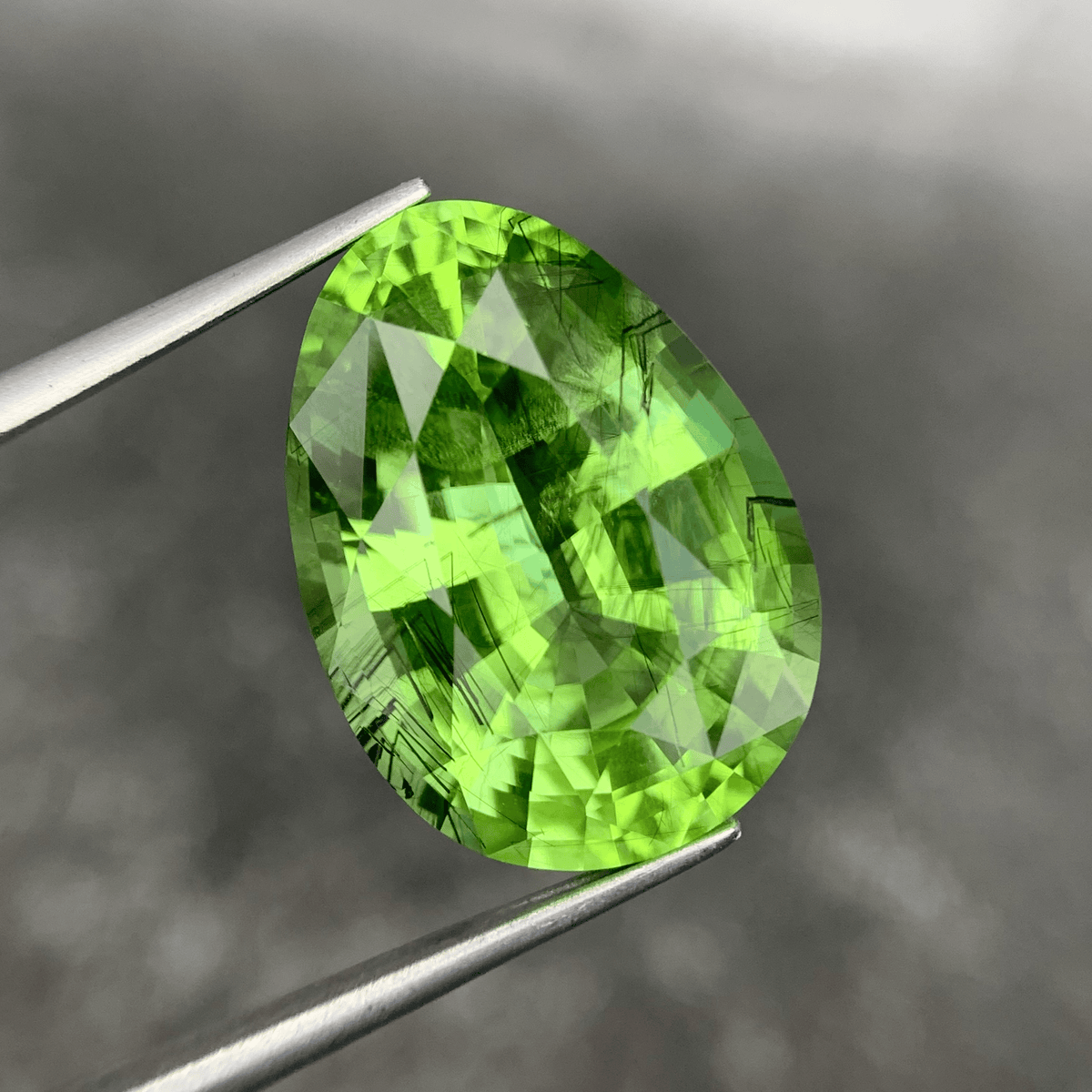  19.26ct Ludwigite Inclusion Peridot