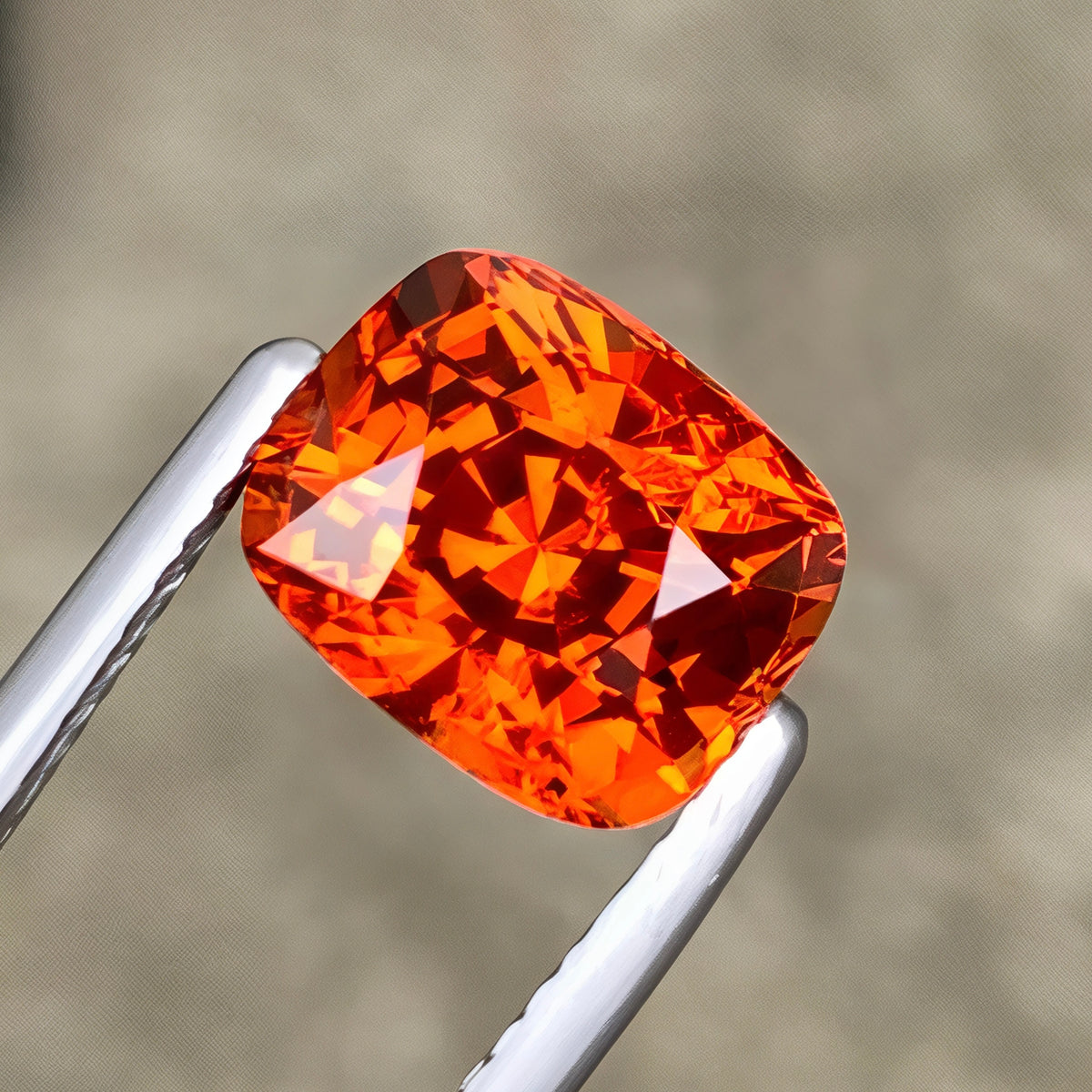 bright-orange-spessartite-garnet-4-51ct-africa-vs-cushion-fancy-cut