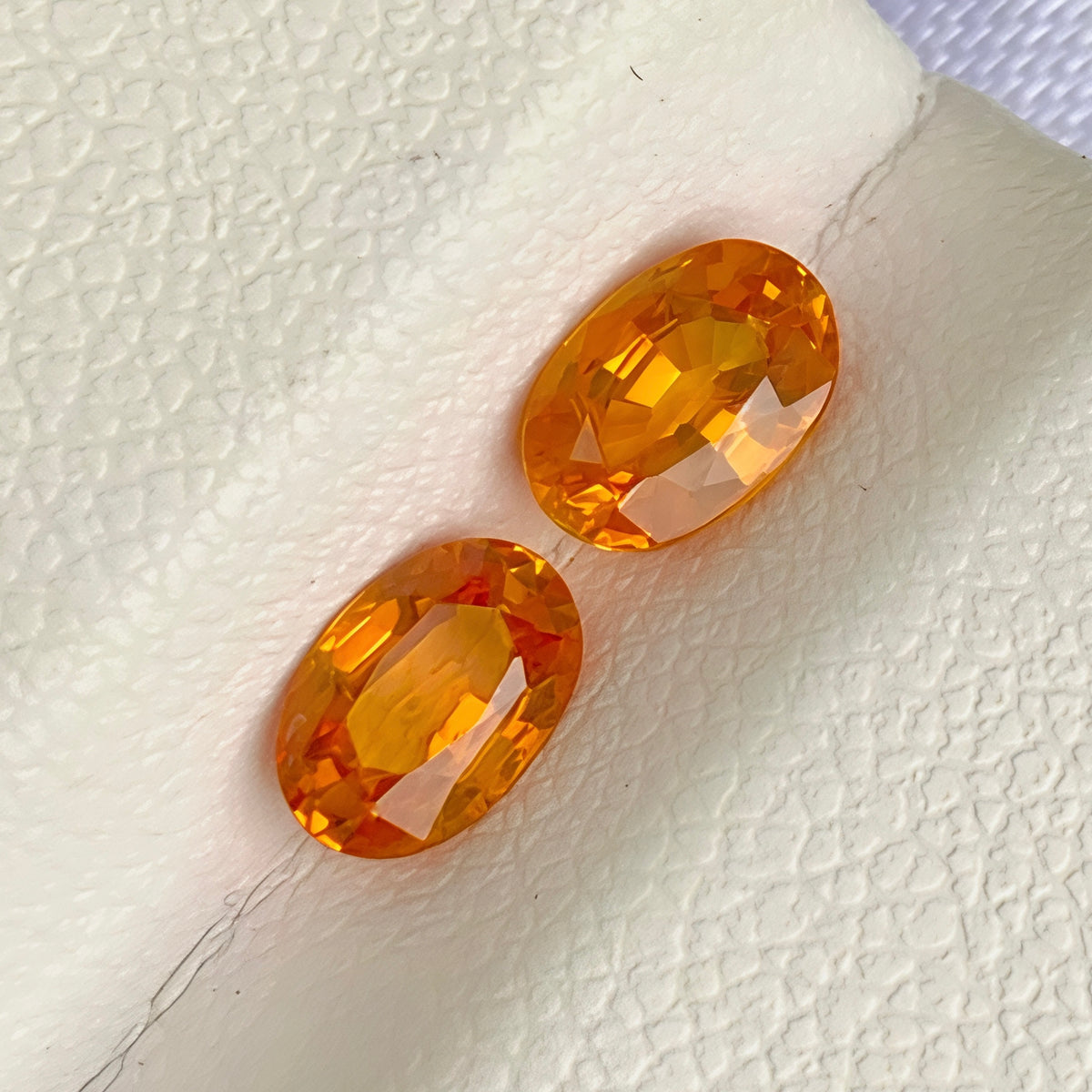 orange-sapphire-pair-1-32-carats-oval-sri-lanka
