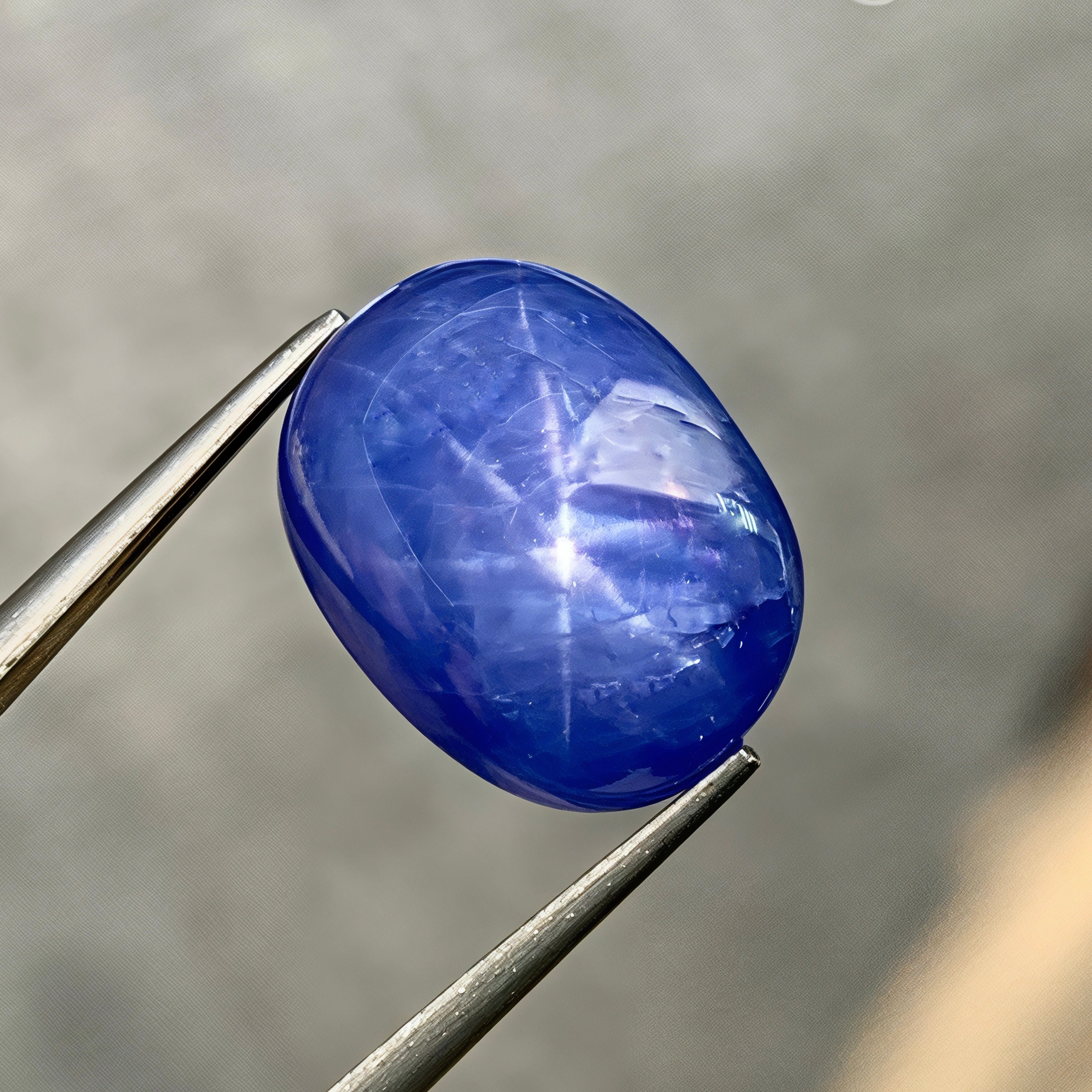12-34-carats-vivid-blue-star-sapphire-oval-cabochon-burma