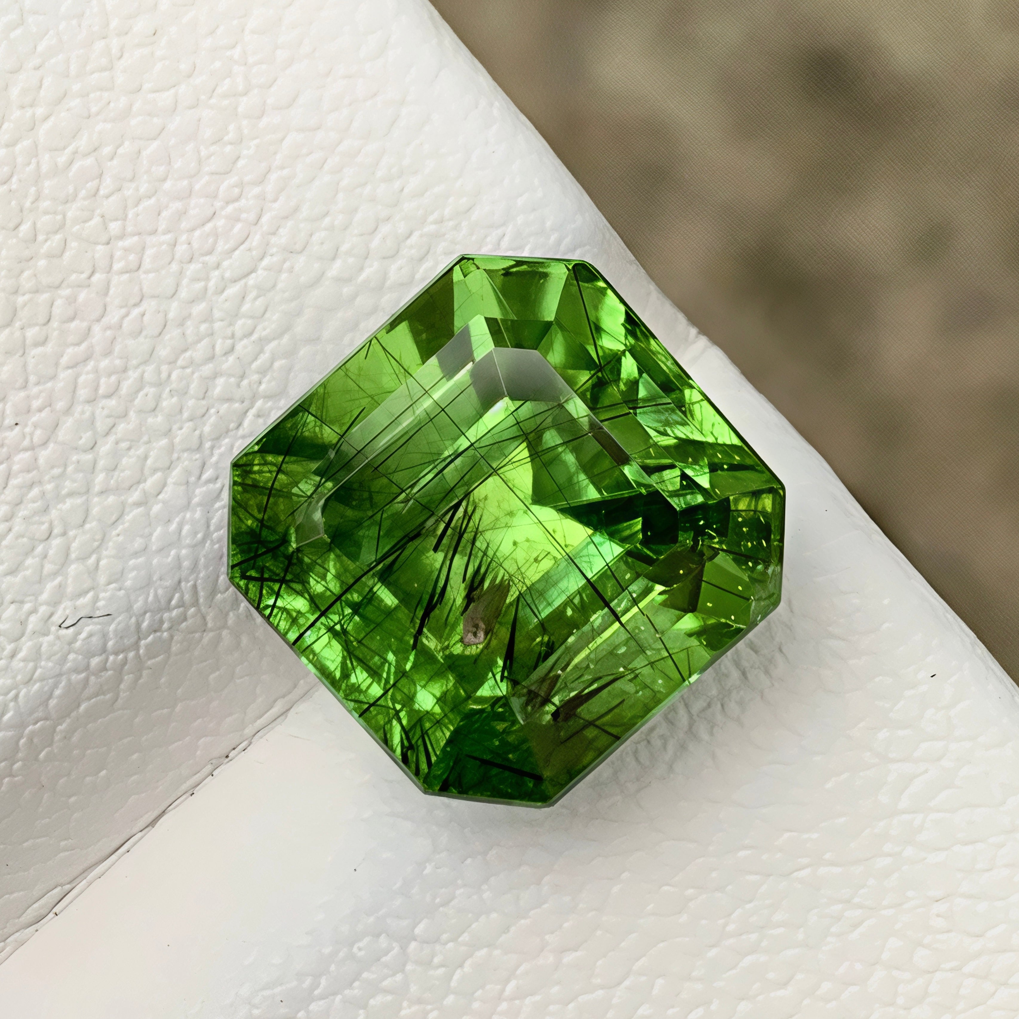 11.07ct Ludwigite Include Peridot Emerald Cut