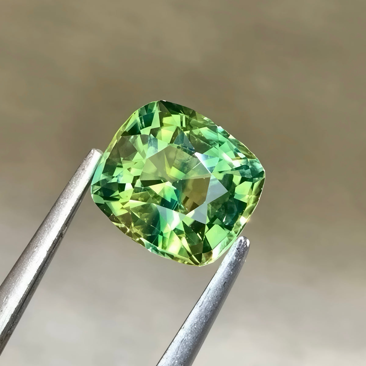natural-teal-sapphire-1-30ct-madagascar-cushion