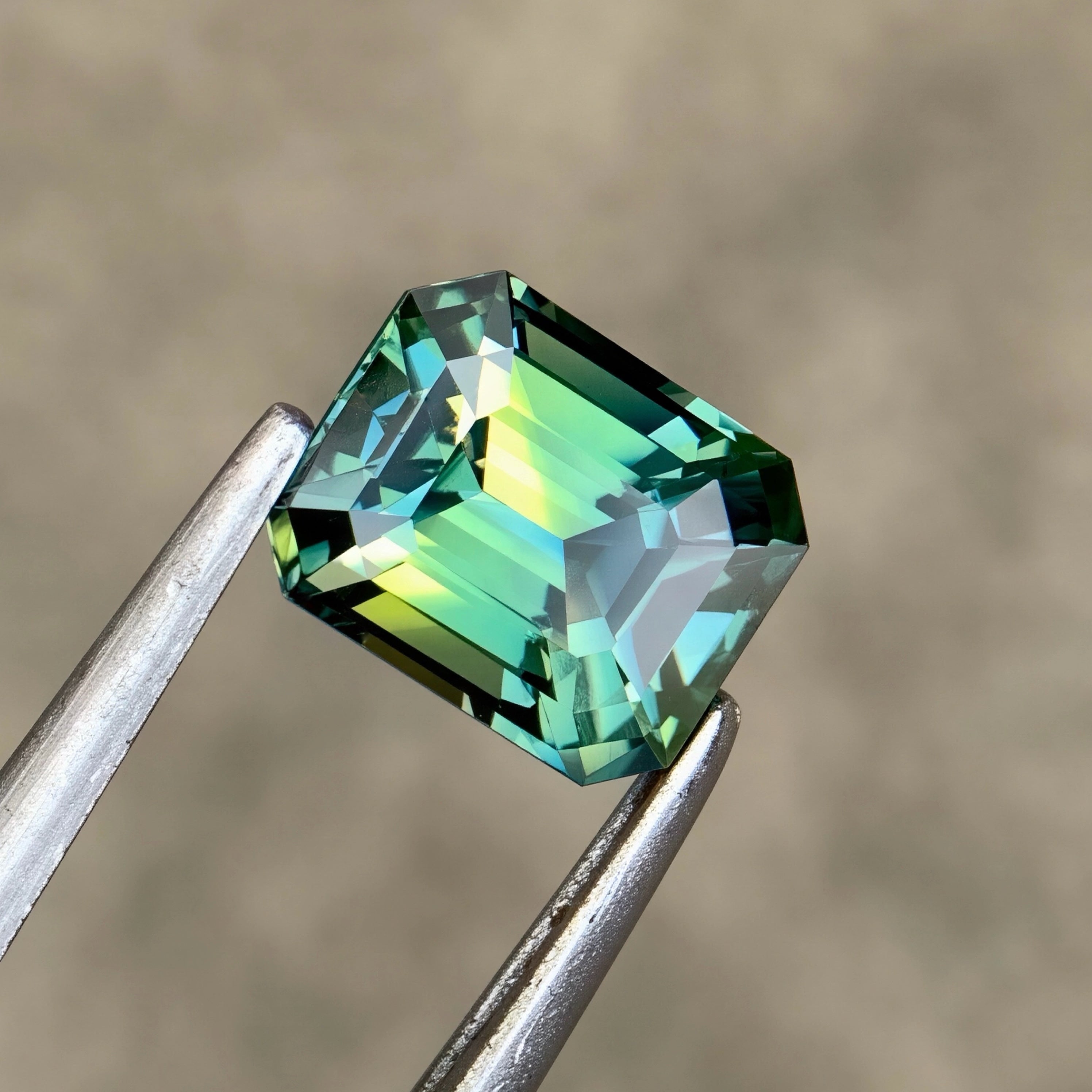 1-16ct-natural-bicolor-sapphire-madagascar-emerald-cut