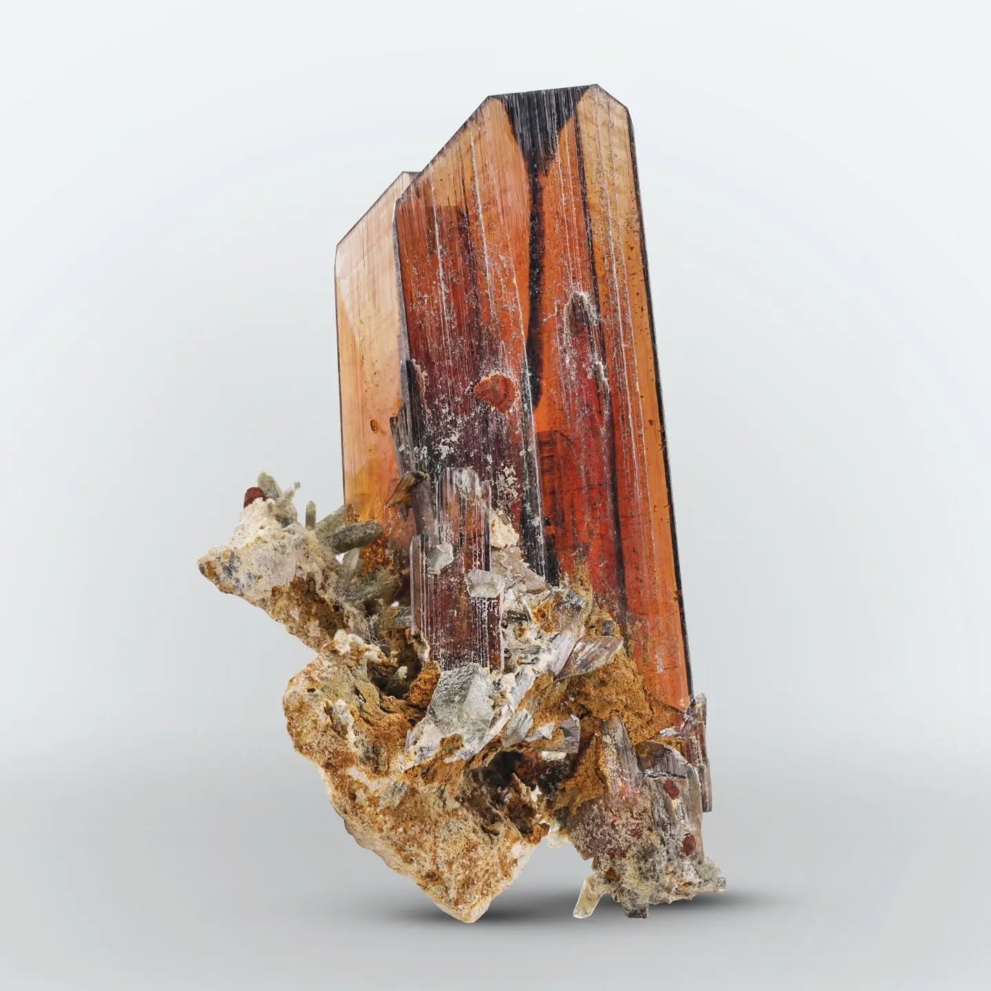 Red Brookite Crystals On Quartz