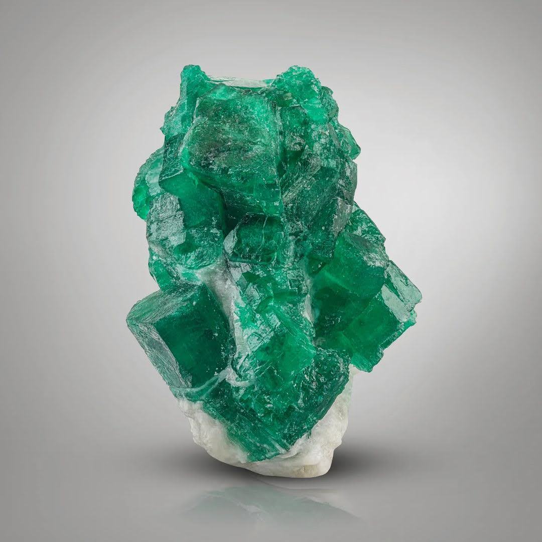 Green Emerald Crystal On Calcite