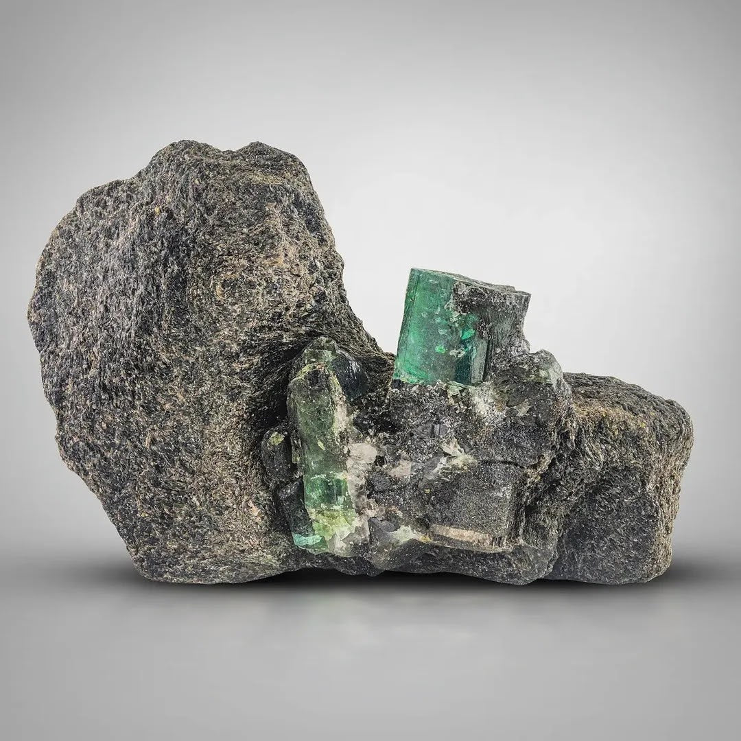 Green Emerald Crystals on Calcite