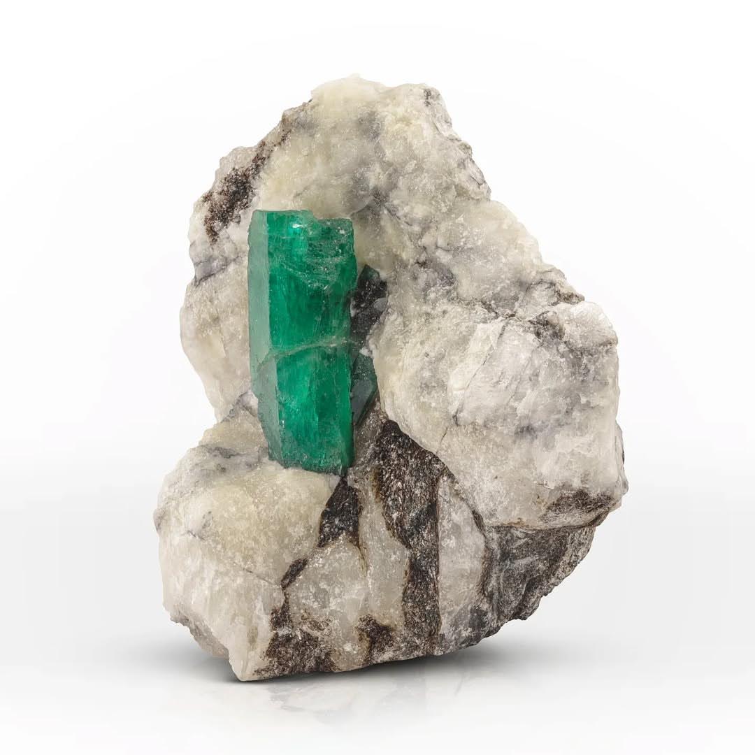 Deep Green Emerald Crystal On Calcite