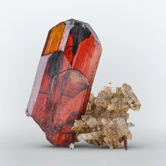 Red Brookite Crystals On Quartz