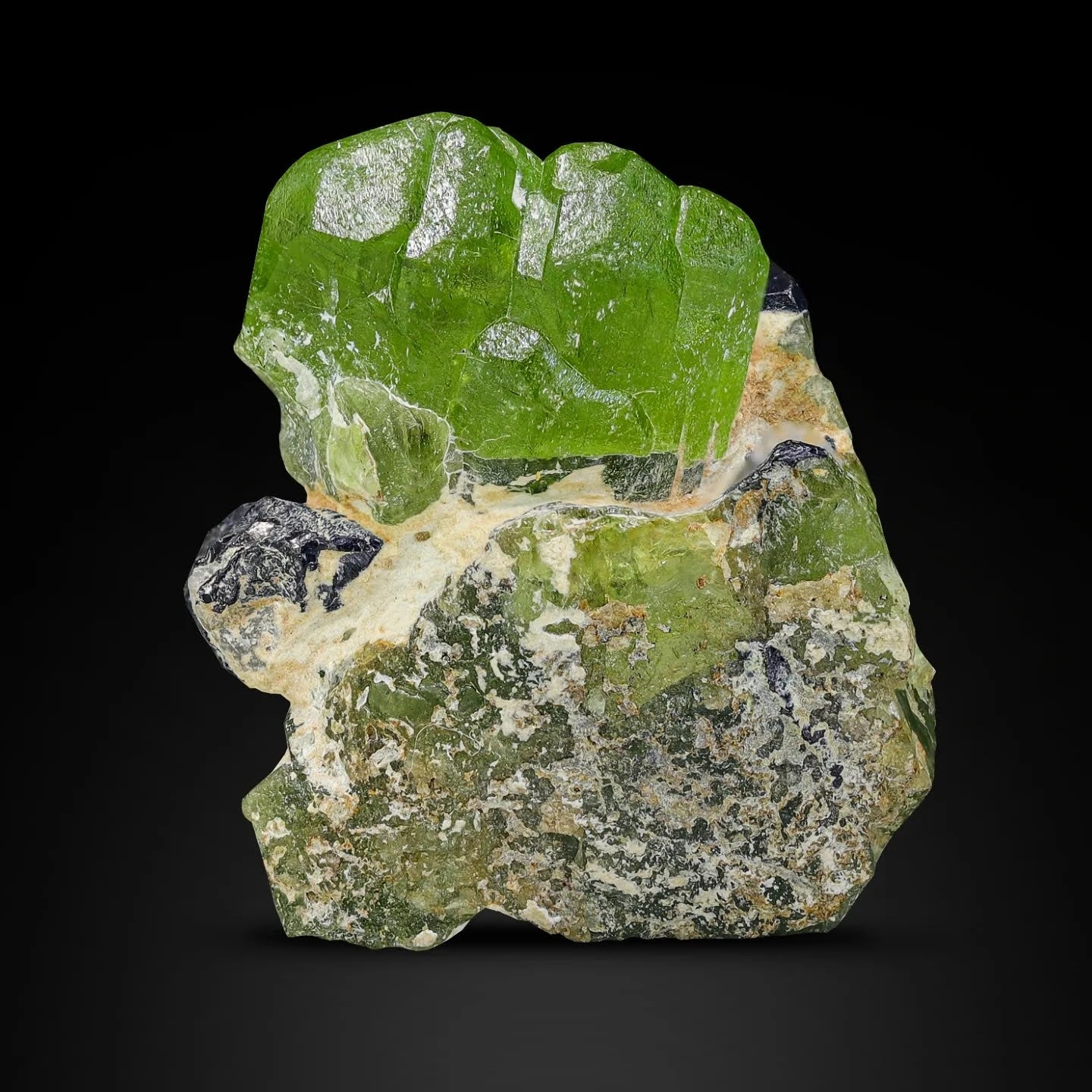 Peridot Crystal with Magnetite