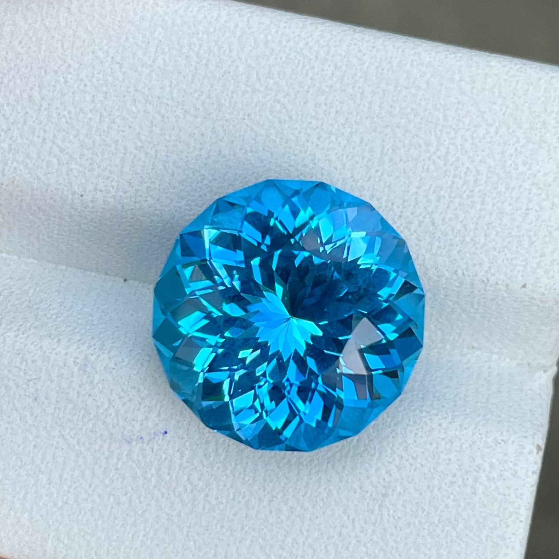 12.15 carats Round Neon Blue Topaz