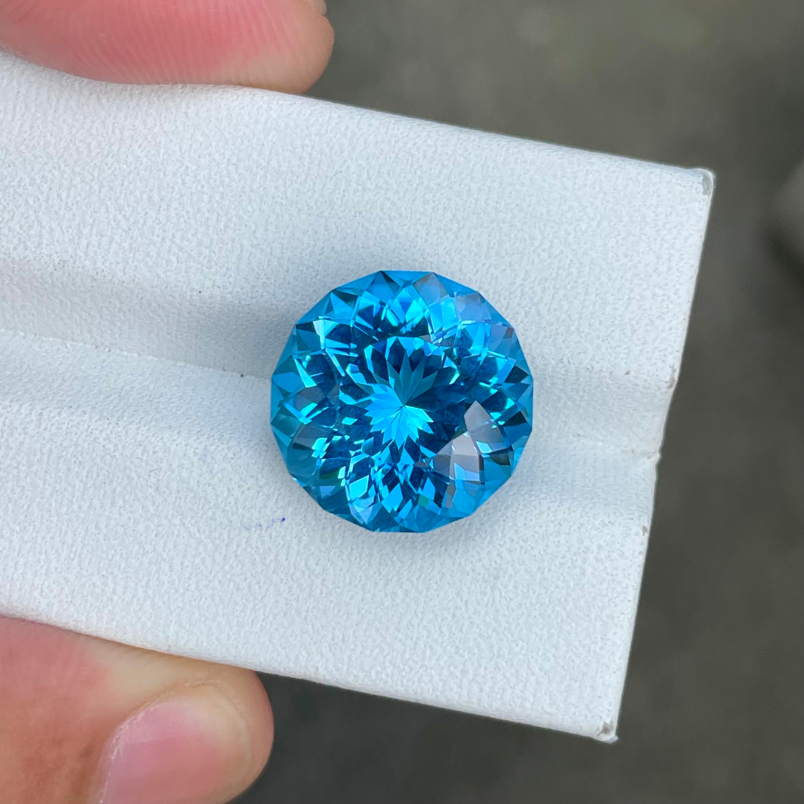12.15 carats Round Neon Blue Topaz