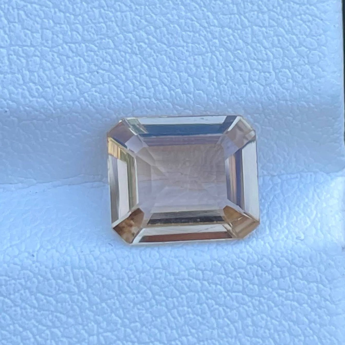 Peachy Topaz 2.50 carats Emerald Cut