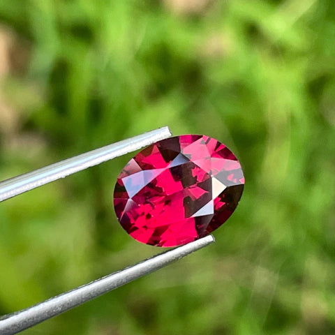 Wellness of Bright Red Rhodolite Garnet 3.05 carats Oval Shaped Madagascar's Gemstone