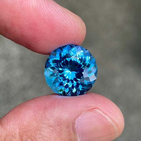 12.15 carats Round Neon Blue Topaz