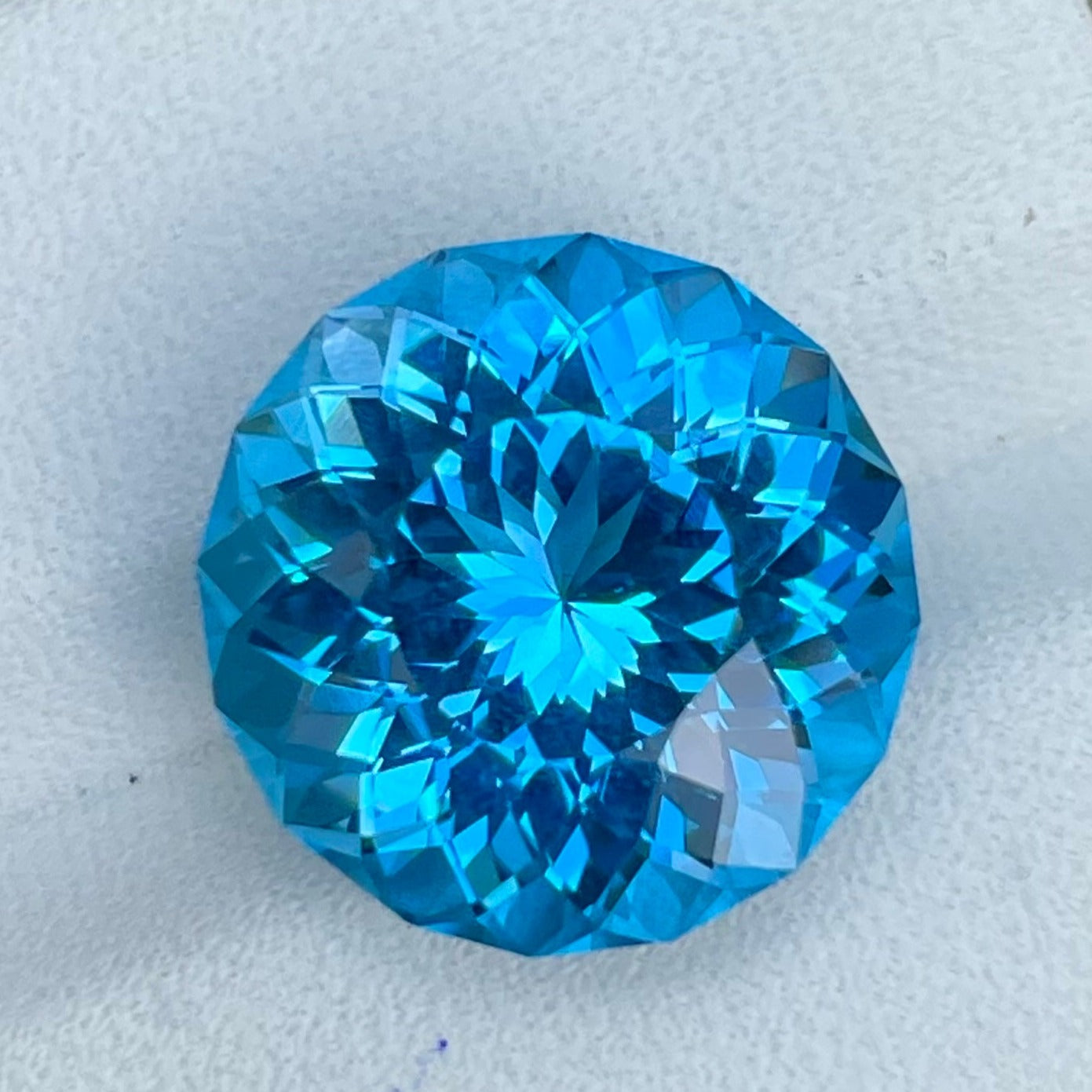 12.15 carats Round Neon Blue Topaz