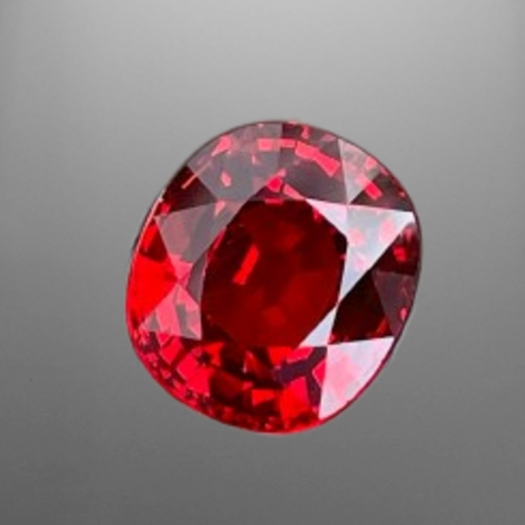 Iridescent Red Spessartite Garnet 6.15 carats Fancy Oval Cut Tanzanian Gemstone