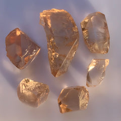 Faceting rough Golden topaz