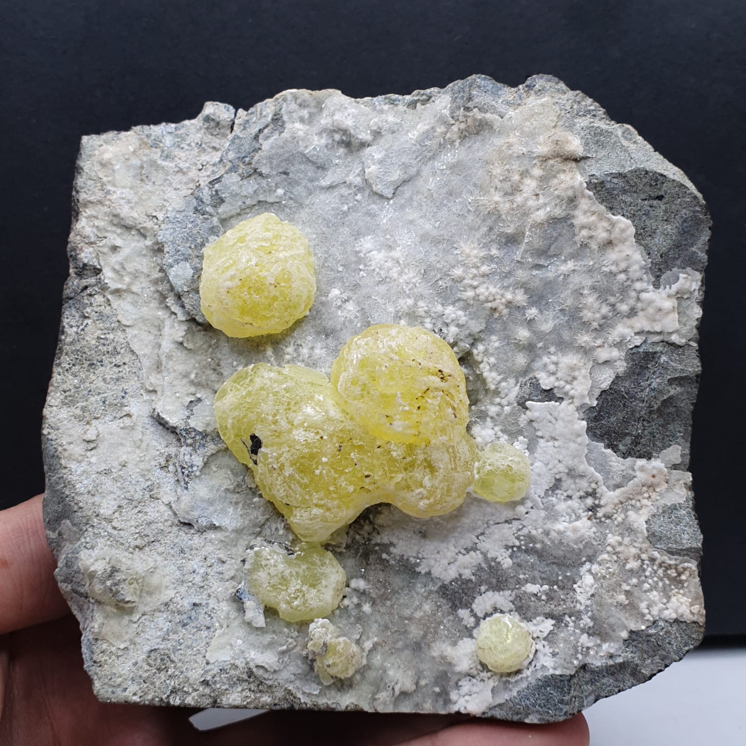 Colorful Isolated Rounded Brucite on White Hydromagnesite