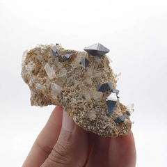 Featuring Isolated Anatase Crystals on Lemonite Matrix with Quartz