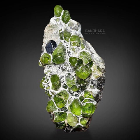 Gemmy Peridot Cluster on Matrix with Magnetite
