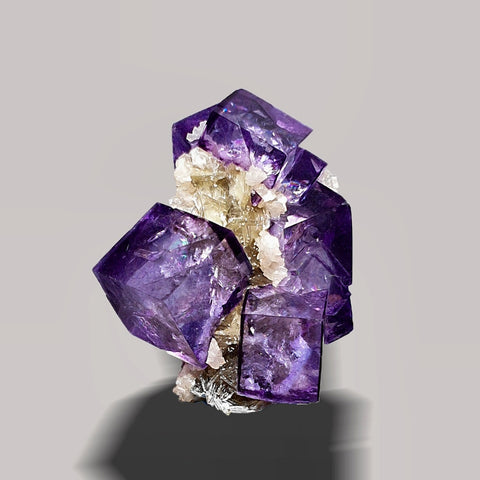 Gemmy Purple Fluorite Crystals on Dolomite Matrix with Muscovite