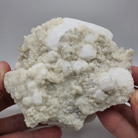 Isomatric Ball Of Pollucite With Herderite On Lepidolite Matrix