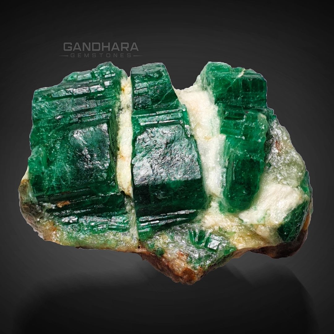 Pure Green Emerald Crystals on Calcite
