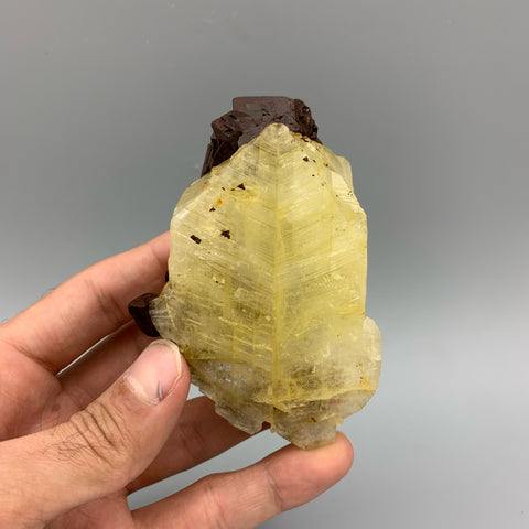 Siderite Twinned Crystal Aggregate On Orthoclase