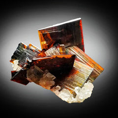 Vibrant Red Brookite Cluster on Quartz