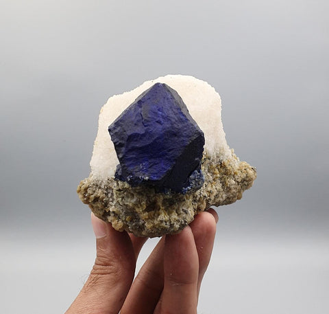 Vibrant Blue Isomatric and Isolated Lazurite Ball on Calcite with Pyrite