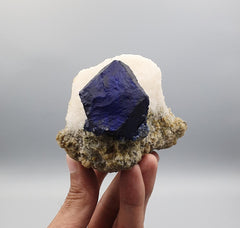 Vibrant Blue Isomatric and Isolated Lazurite Ball on Calcite with Pyrite