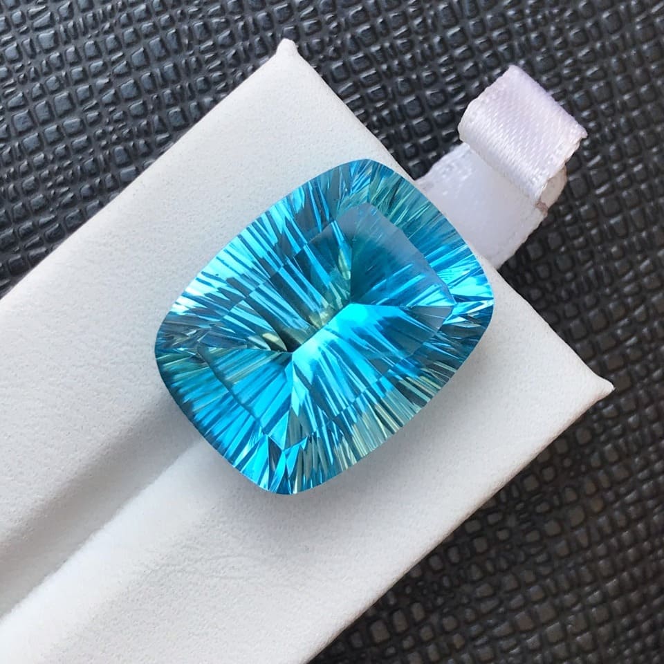 concave cut blue topaz - gandhara gems