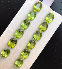 oval cut calibrated sizes peridot - gandharagems